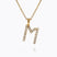 Caroline Svedbom - Mini Letter Necklace Letter M Gold