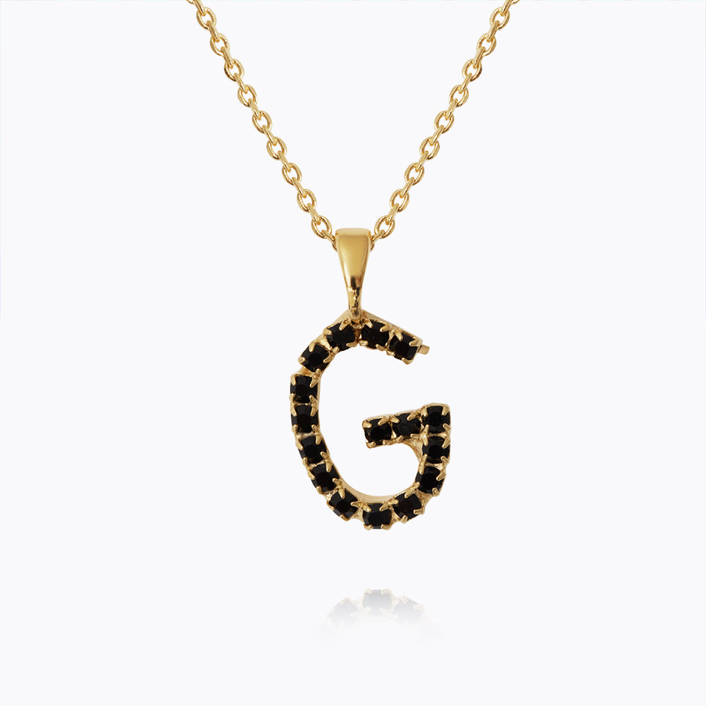 Caroline Svedbom - Mini Letter Black Necklace Letter G Gold
