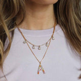 https://cdn.shopify.com/s/files/1/2717/9338/files/Letter_necklace_combo_website.mp4?v=1618218185