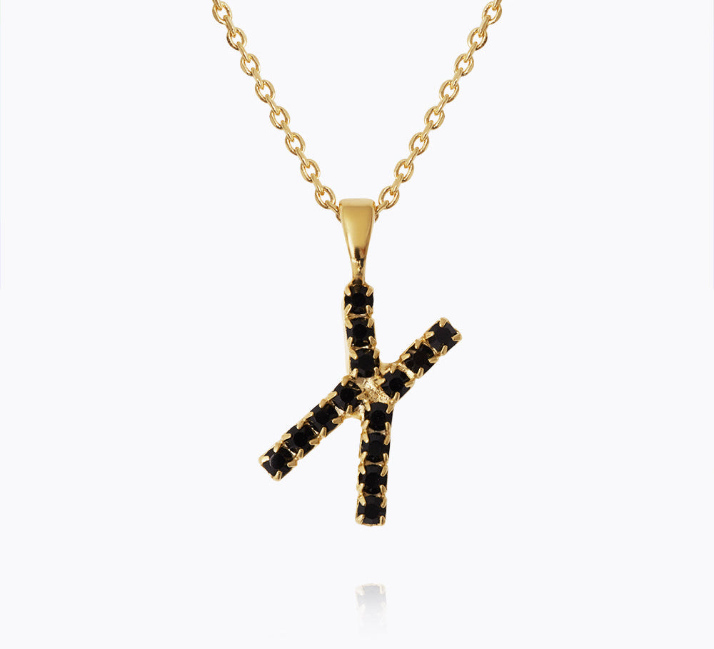 Caroline Svedbom - Mini Letter Black Necklace Letter X Gold