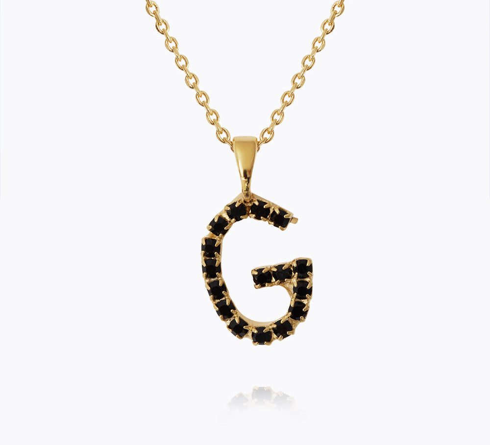 Caroline Svedbom - Mini Letter Black Necklace Letter G Gold