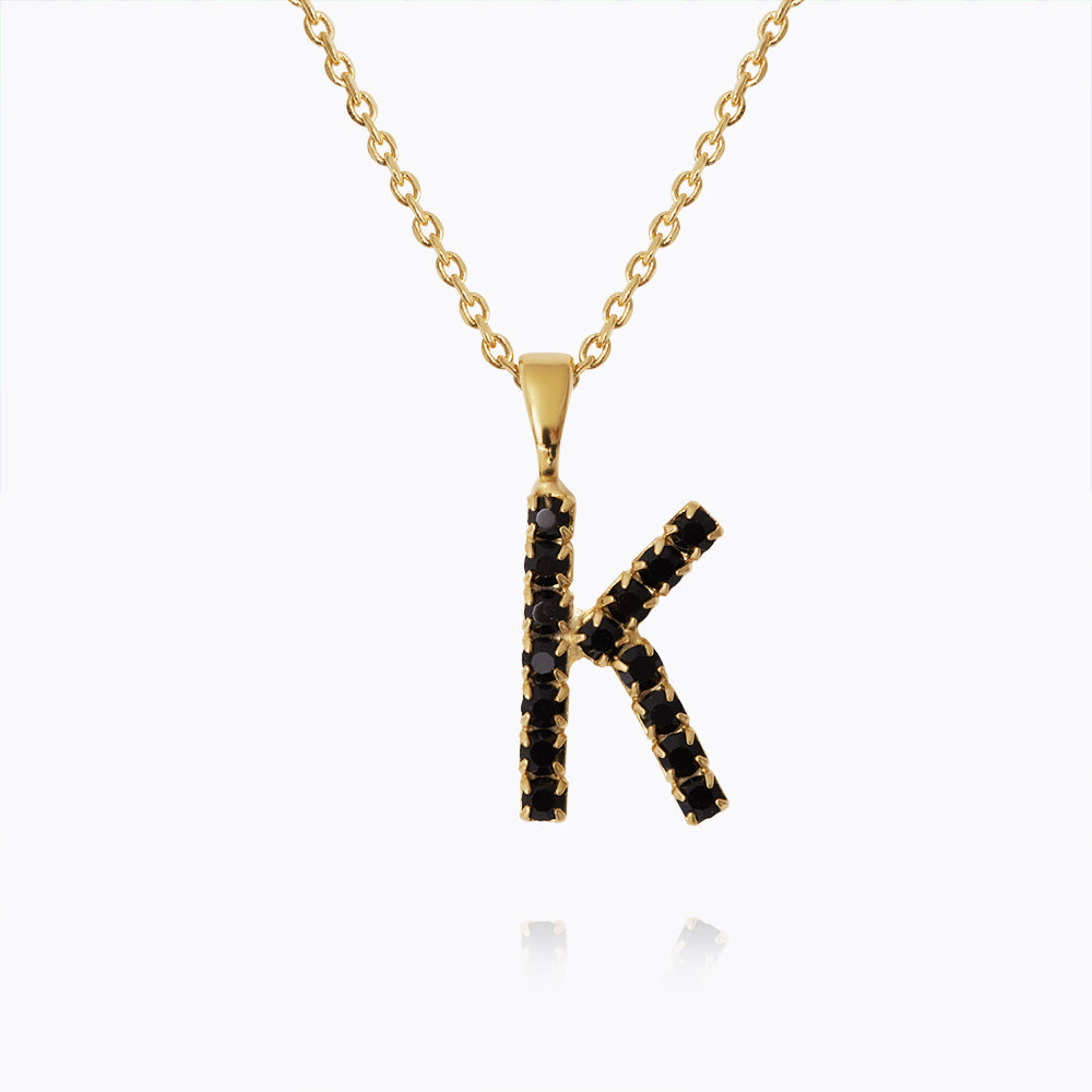 Caroline Svedbom - Mini Letter Black Necklace Letter K Gold