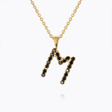 Caroline Svedbom - Mini Letter Black Necklace Letter M Gold